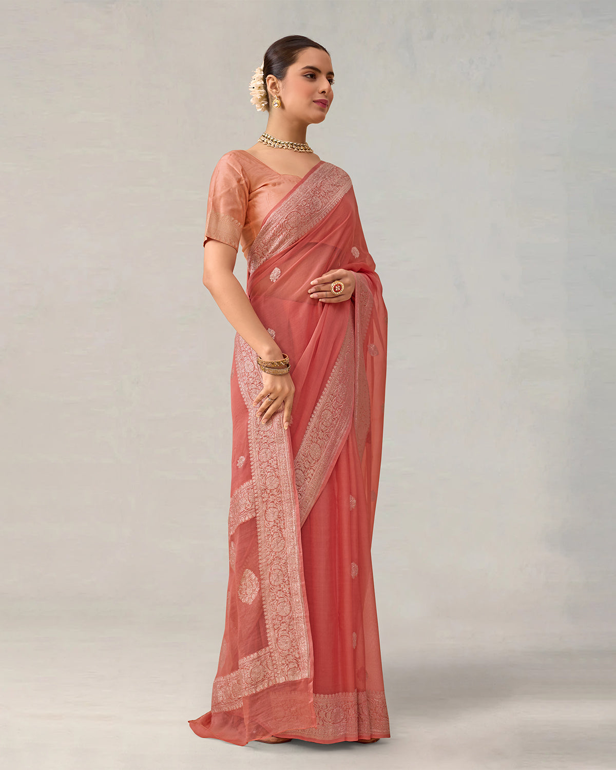 Ethereal Peach-Coral Pure Chiffon Saree with Timeless ' Kadhuwa' Weaving Buti
