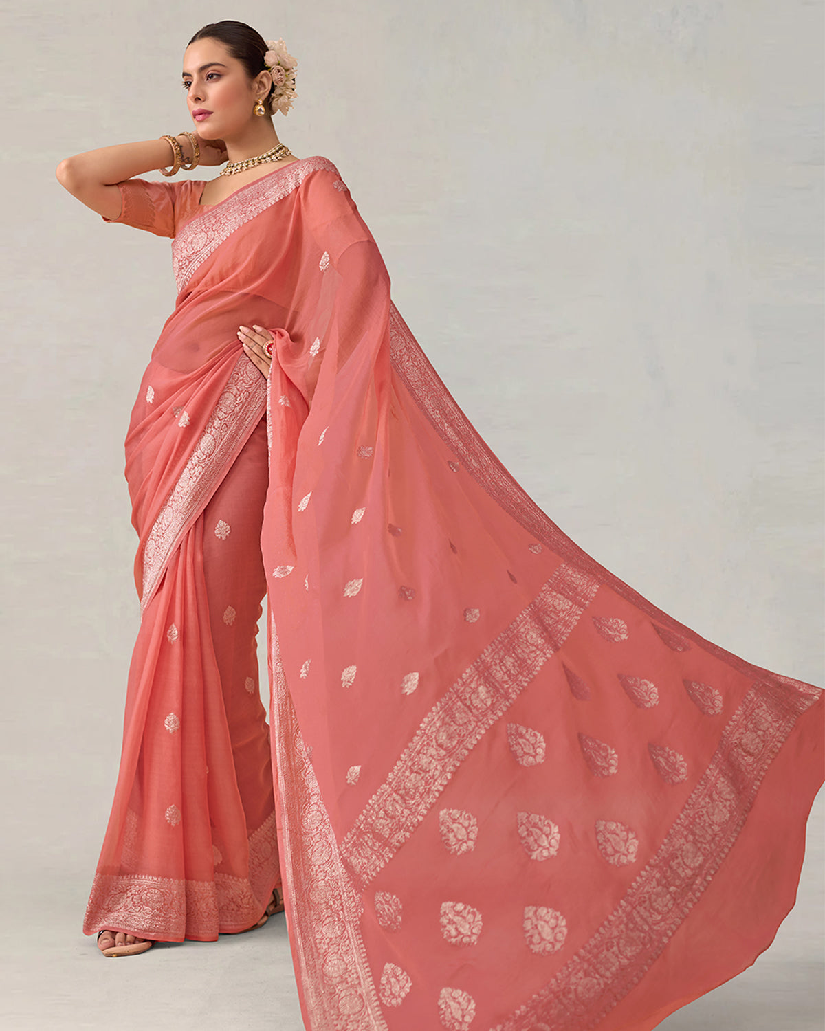 Ethereal Peach-Coral Pure Chiffon Saree with Timeless ' Kadhuwa' Weaving Buti