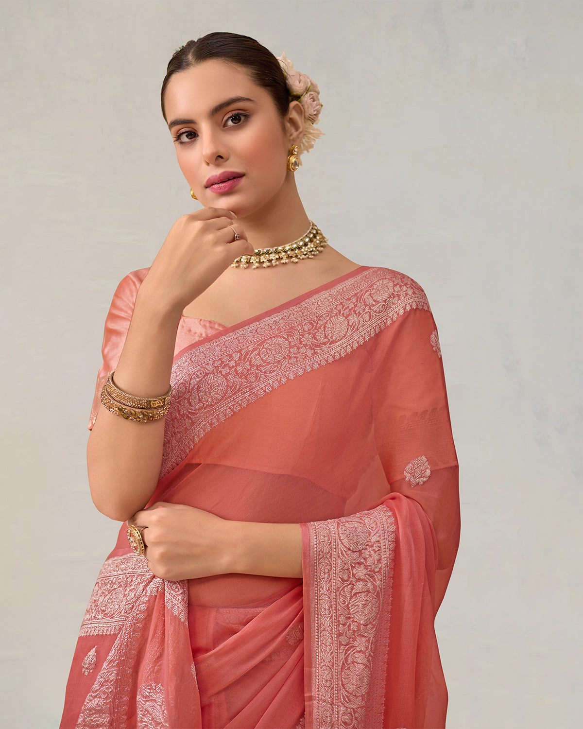 Ethereal Peach-Coral Pure Chiffon Saree with Timeless ' Kadhuwa' Weaving Buti