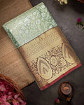Green Kanjivaram Silk Saree with Floral Jaal and Rich Border with Paisley Weaving