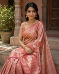 Soft Peach Kanjivaram Silk Saree with Floral Weaving and Paisley Accents
