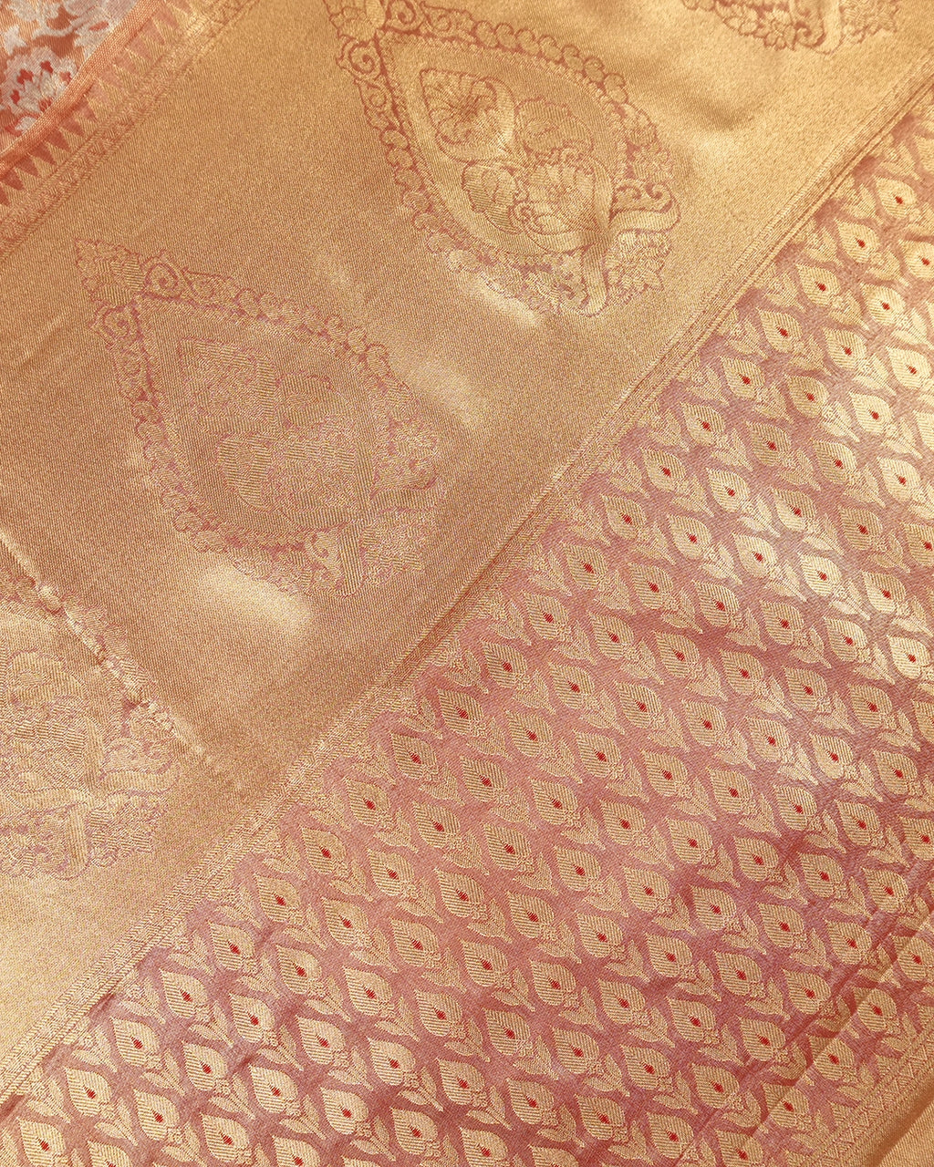 Soft Peach Kanjivaram Silk Saree with Floral Weaving and Paisley Accents
