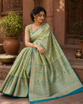 Elegant Green Kanjivaram Silk Saree with Floral Jaal Zari and Contrast Border