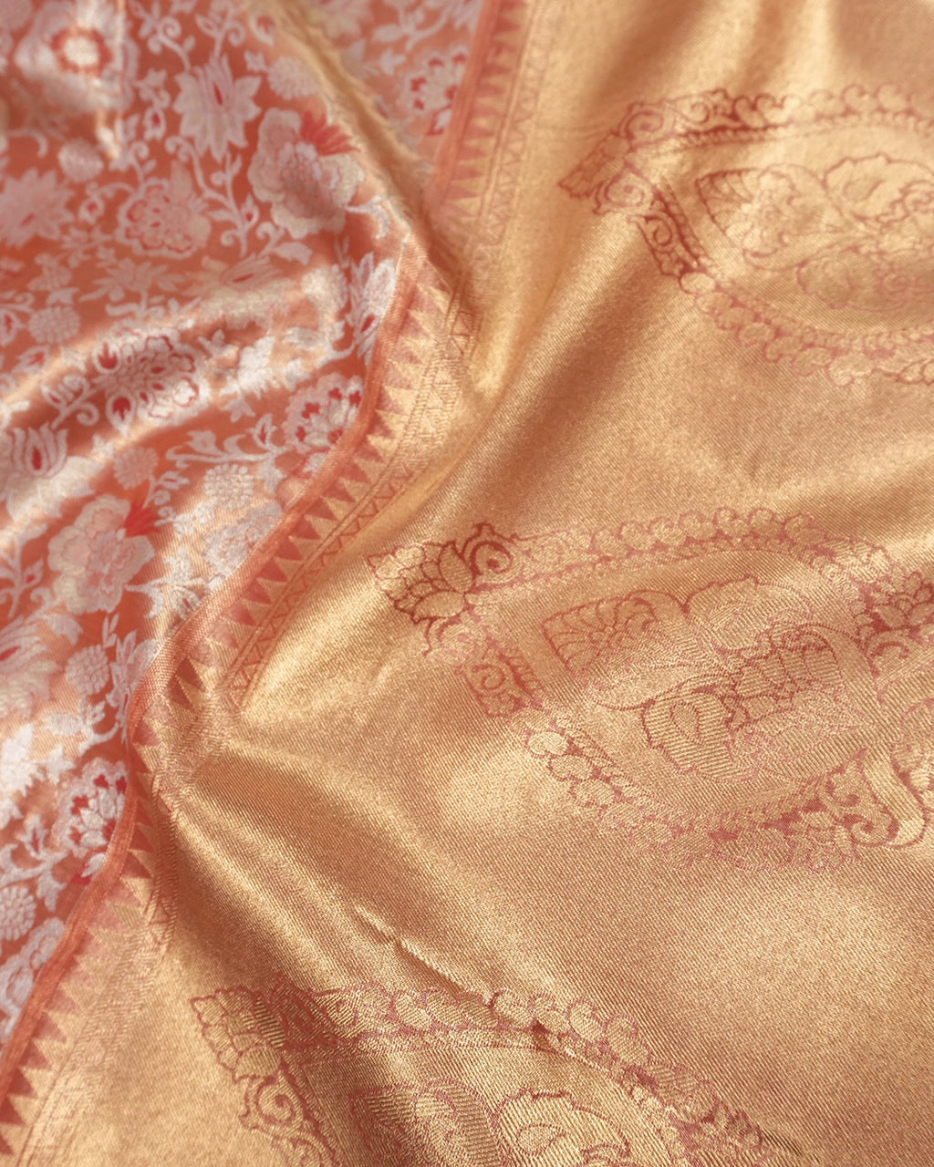 Soft Peach Kanjivaram Silk Saree with Floral Weaving and Paisley Accents