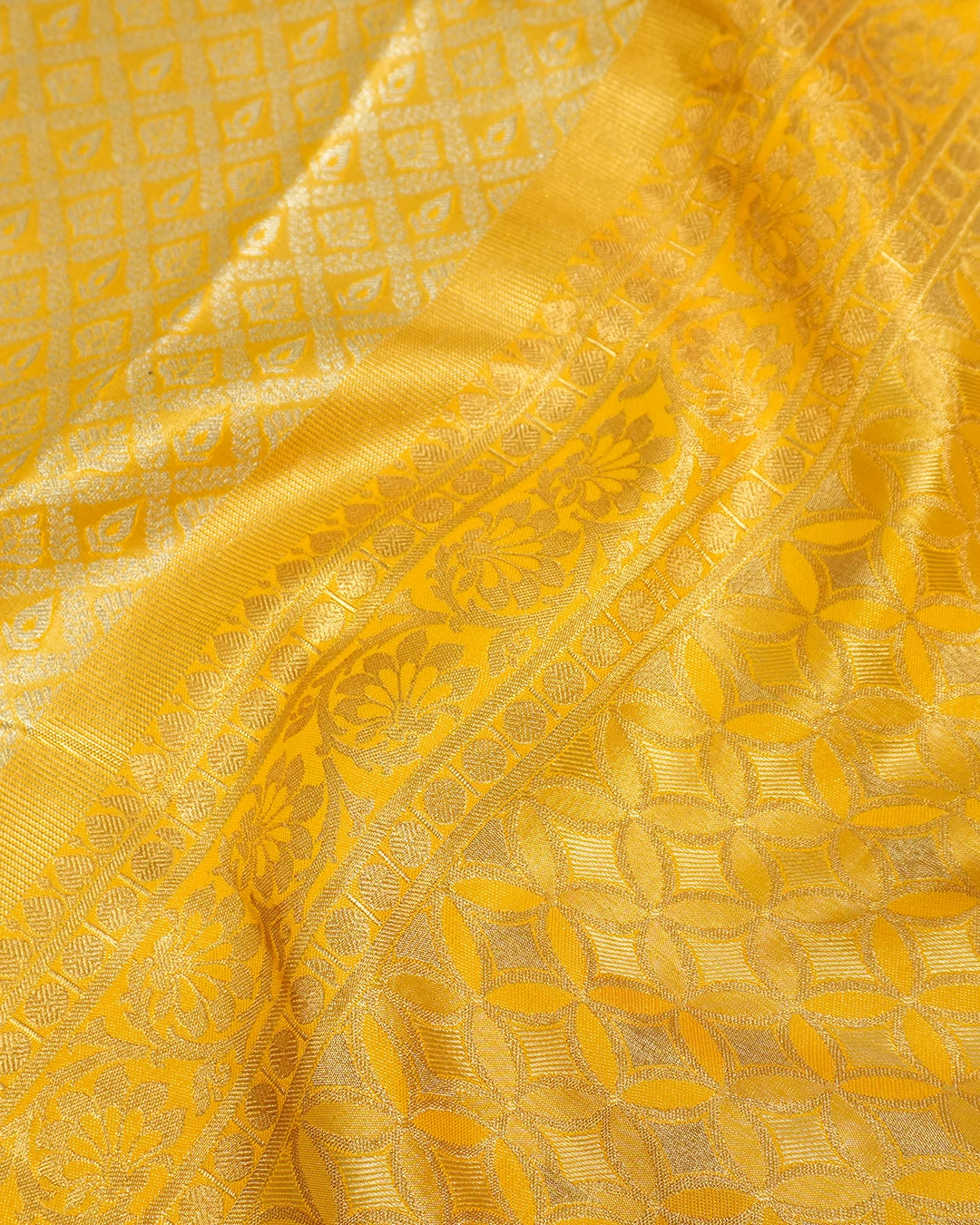 Yellow Kanjivaram Silk Saree with Diamond Weave and Rich Border