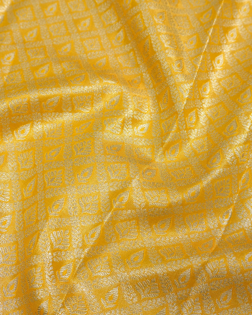 Yellow Kanjivaram Silk Saree with Diamond Weave and Rich Border