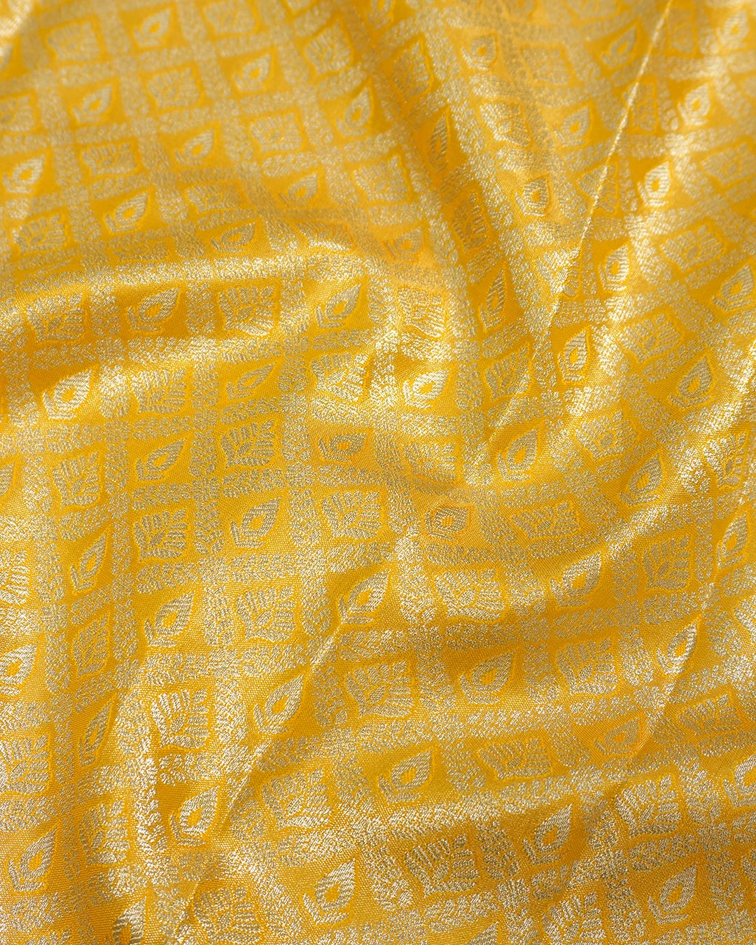 Yellow Kanjivaram Silk Saree with Diamond Weave and Rich Border