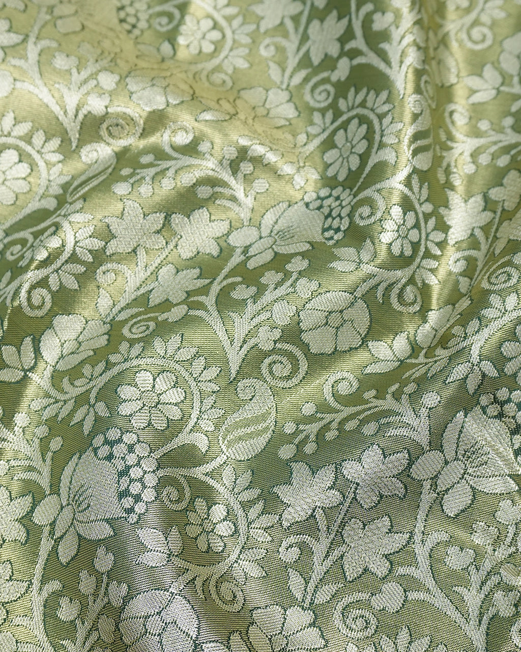 Green Kanjivaram Silk Saree with Floral Jaal and Rich Border with Paisley Weaving