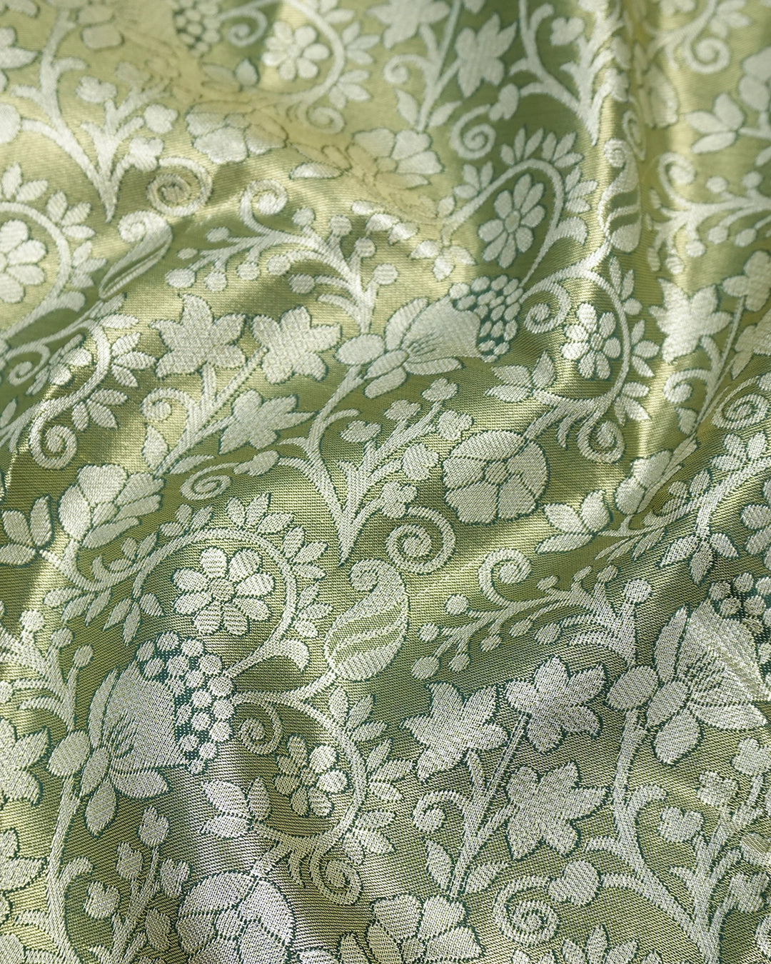 Green Kanjivaram Silk Saree with Floral Jaal and Rich Border with Paisley Weaving