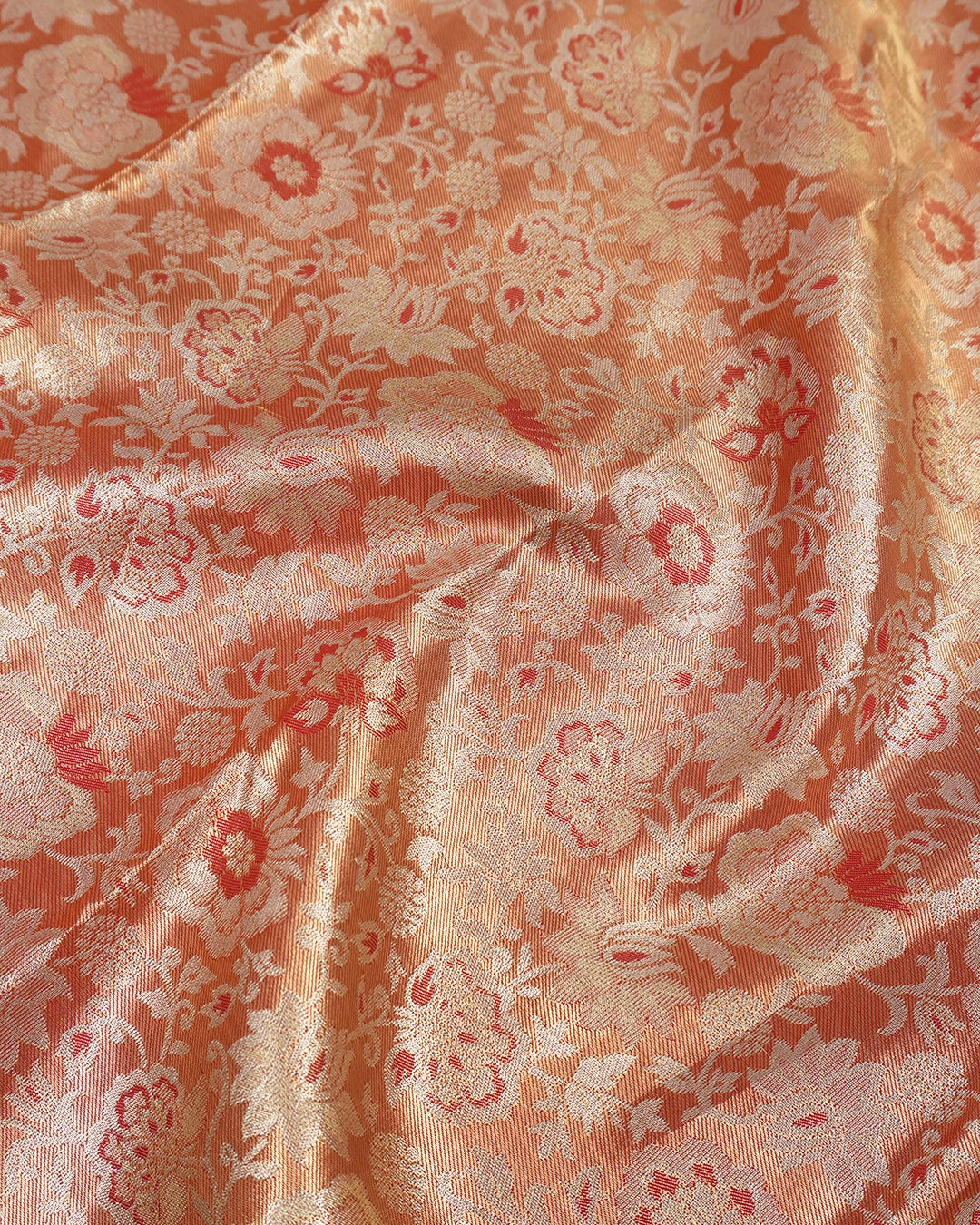 Soft Peach Kanjivaram Silk Saree with Floral Weaving and Paisley Accents