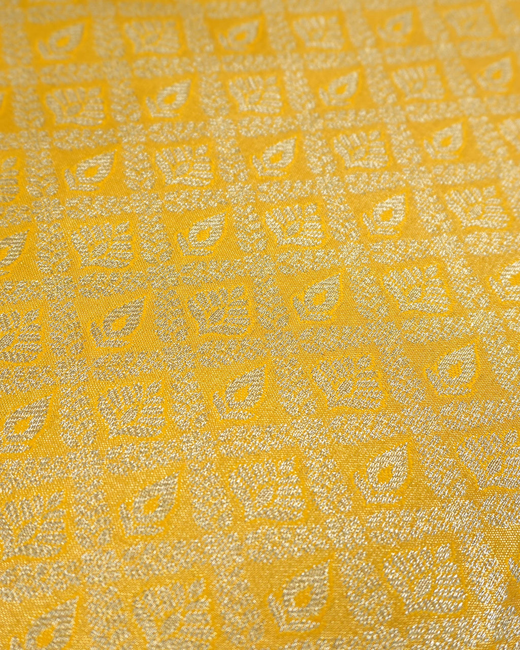 Yellow Kanjivaram Silk Saree with Diamond Weave and Rich Border