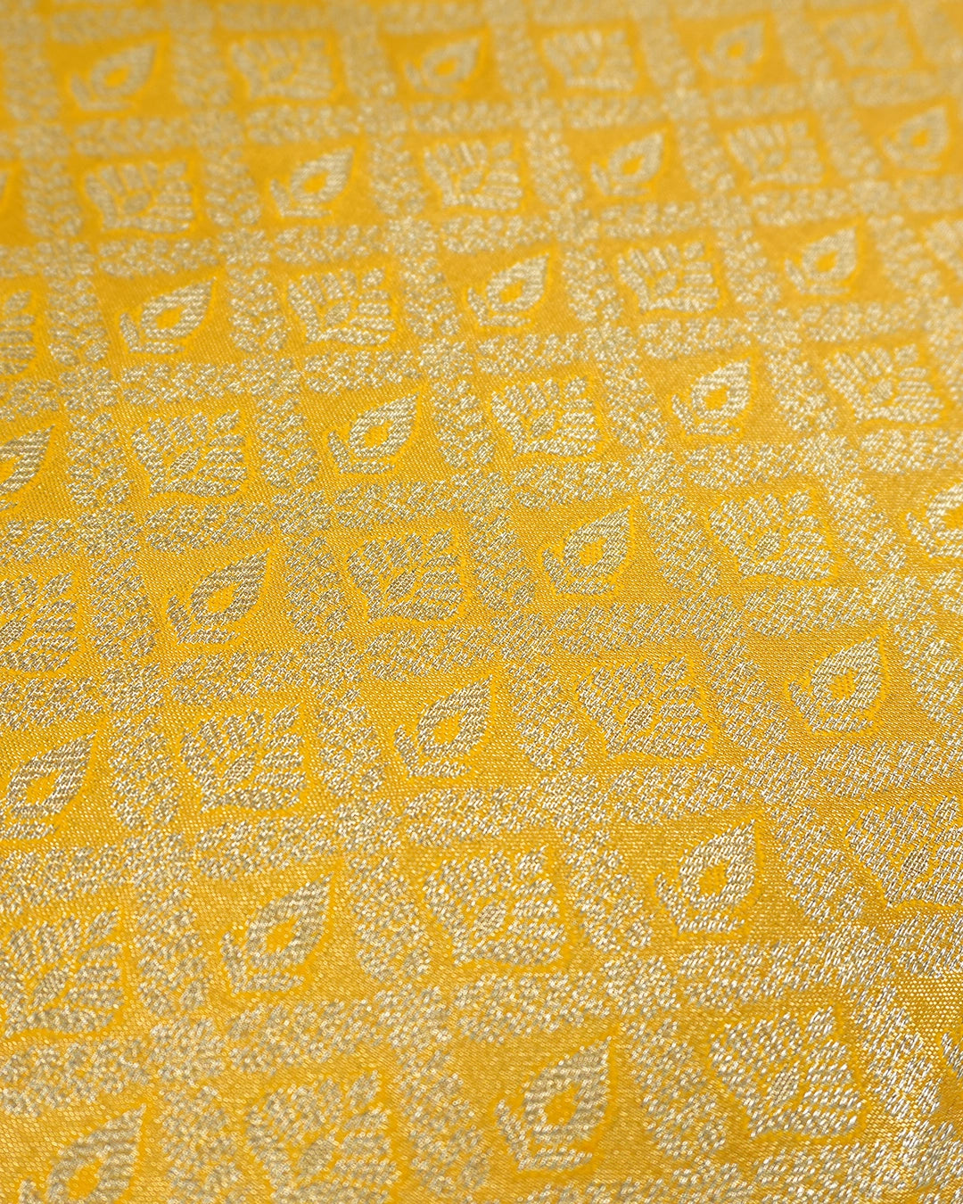 Yellow Kanjivaram Silk Saree with Diamond Weave and Rich Border