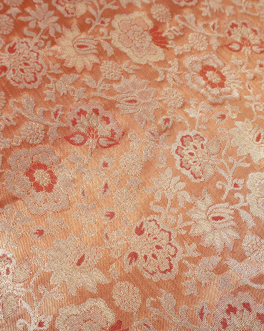 Soft Peach Kanjivaram Silk Saree with Floral Weaving and Paisley Accents