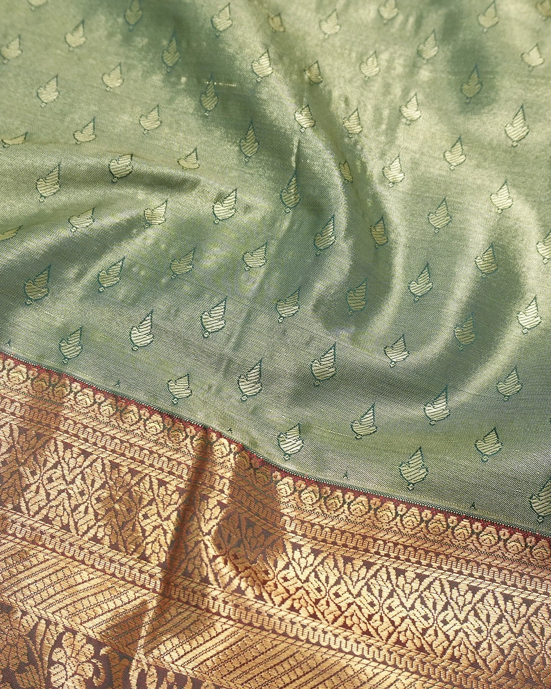 Green Kanjivaram Silk Saree with Floral Jaal and Rich Border with Paisley Weaving
