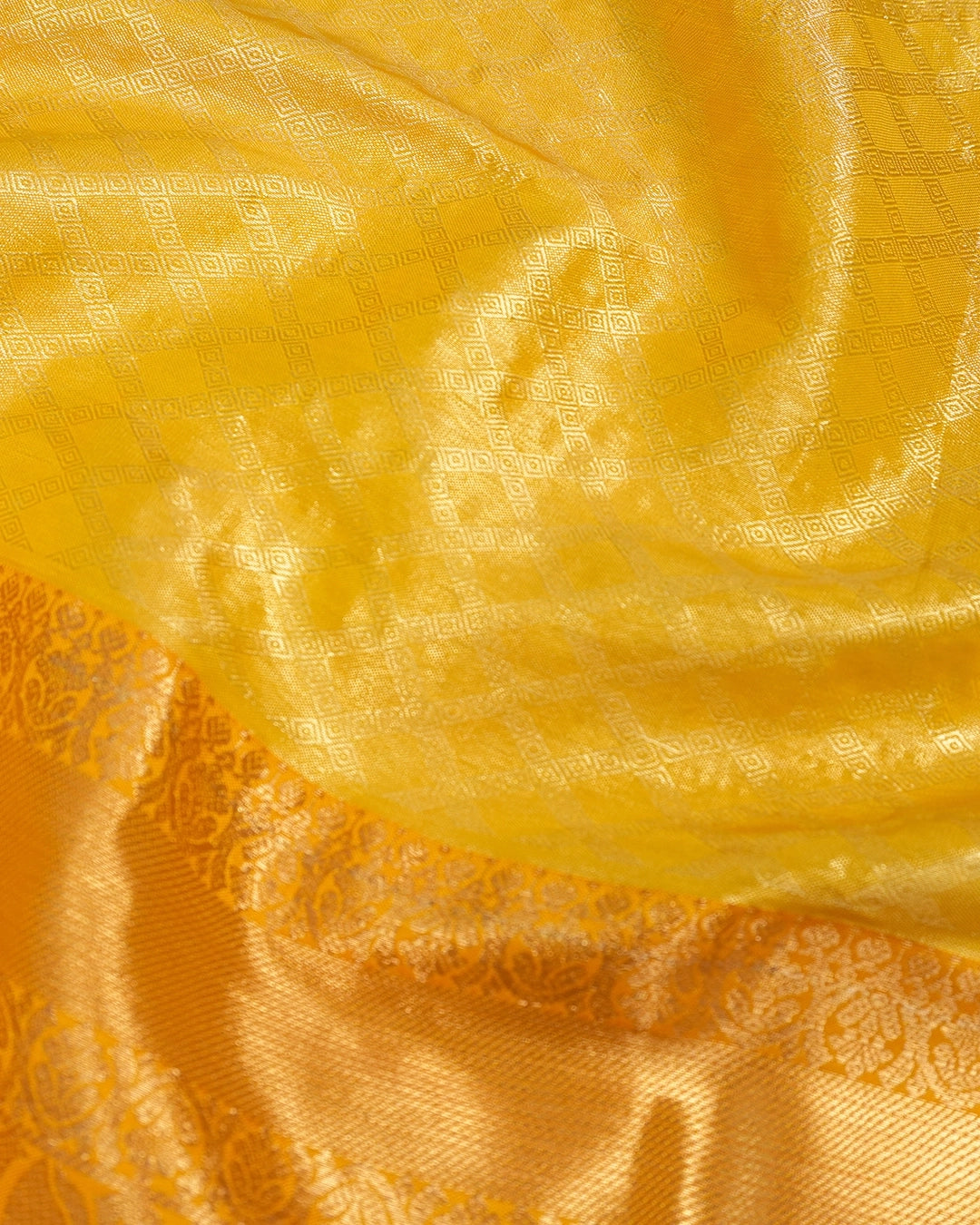 Yellow Kanjivaram Silk Saree with Diamond Weave and Rich Border
