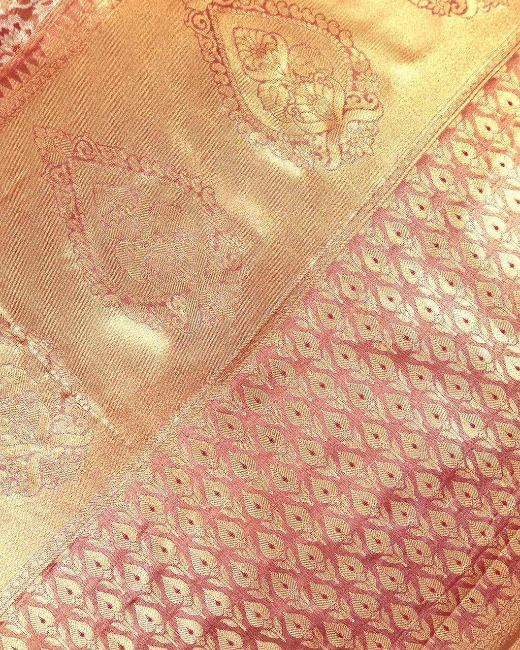 Soft Peach Kanjivaram Silk Saree with Floral Weaving and Paisley Accents