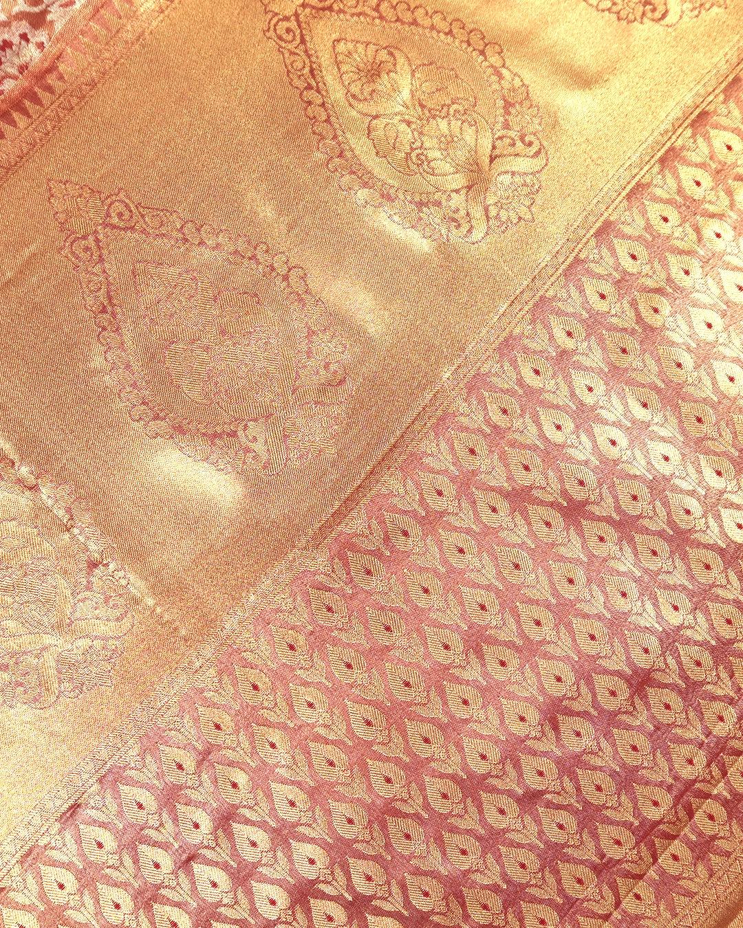 Soft Peach Kanjivaram Silk Saree with Floral Weaving and Paisley Accents