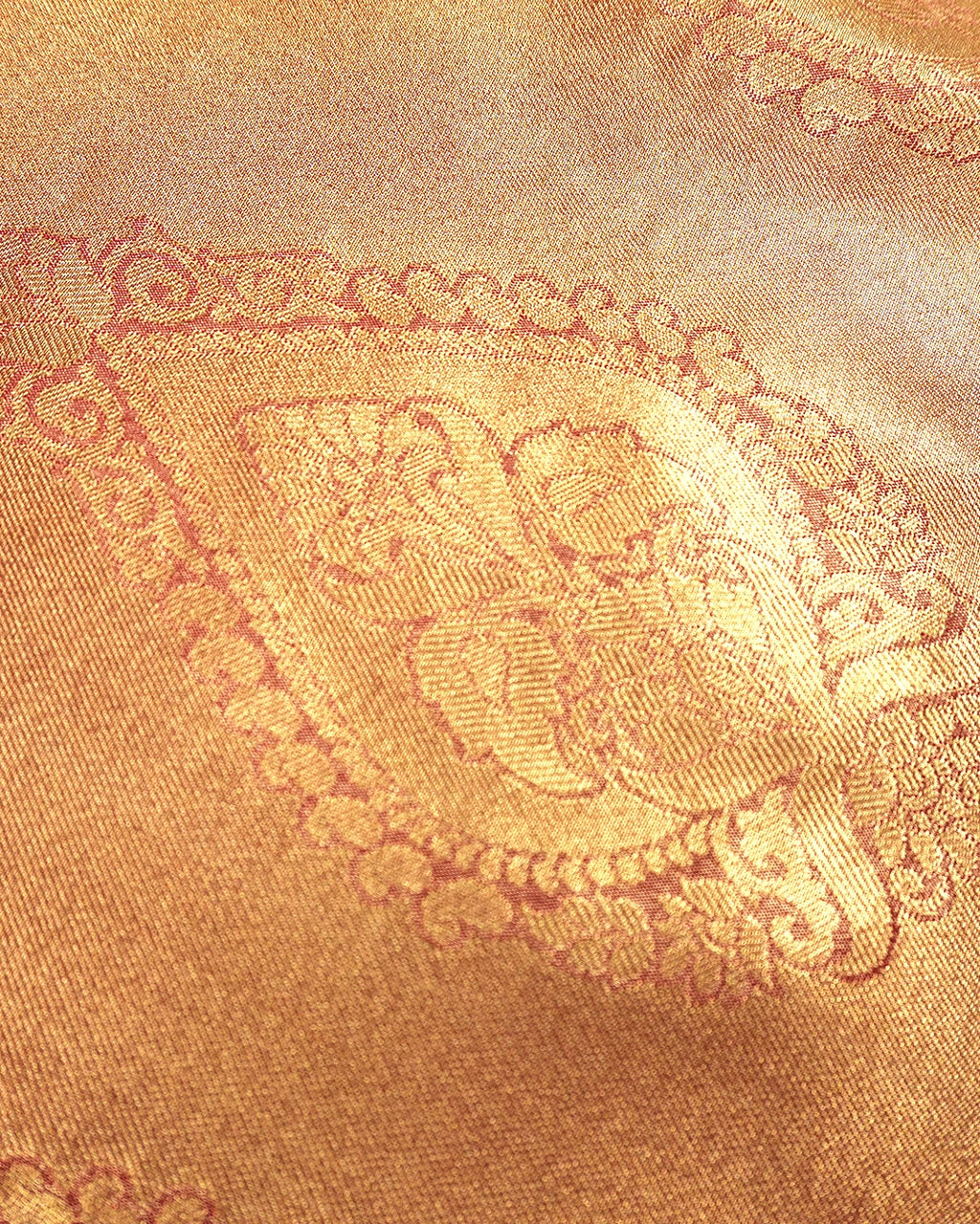 Soft Peach Kanjivaram Silk Saree with Floral Weaving and Paisley Accents