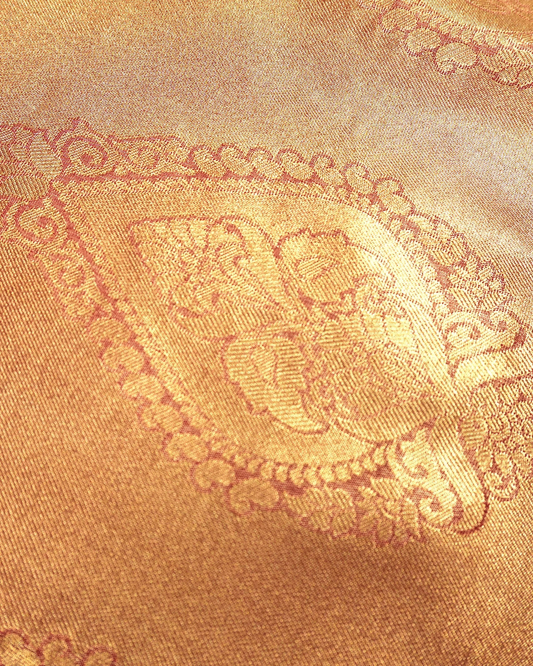 Soft Peach Kanjivaram Silk Saree with Floral Weaving and Paisley Accents