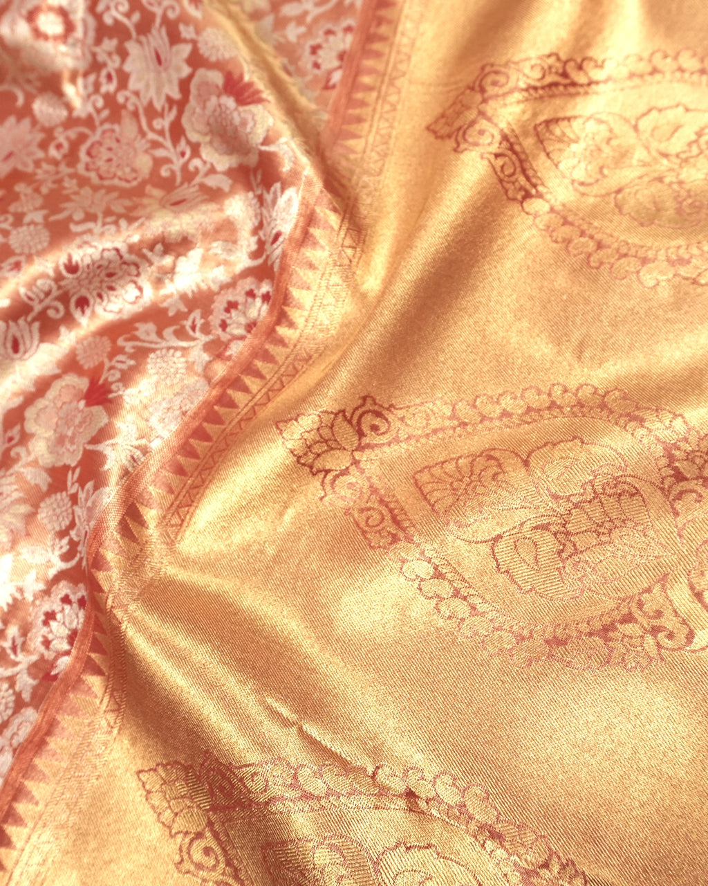 Soft Peach Kanjivaram Silk Saree with Floral Weaving and Paisley Accents