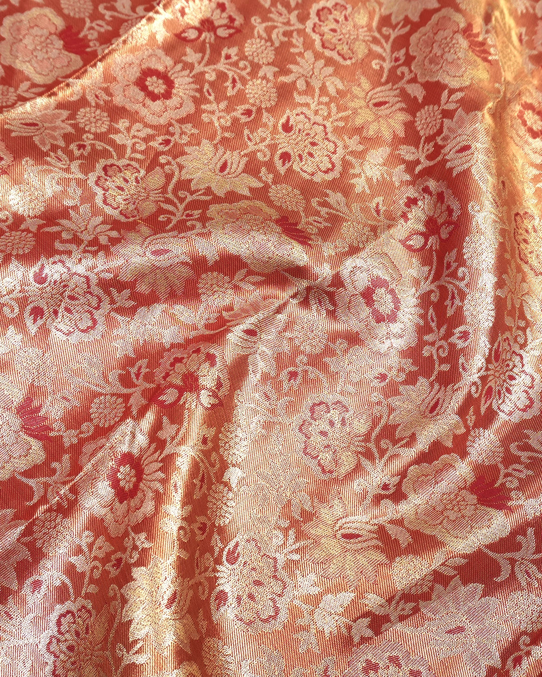 Soft Peach Kanjivaram Silk Saree with Floral Weaving and Paisley Accents