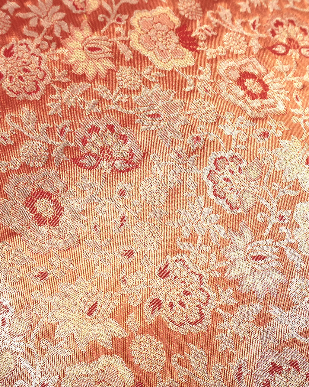 Soft Peach Kanjivaram Silk Saree with Floral Weaving and Paisley Accents