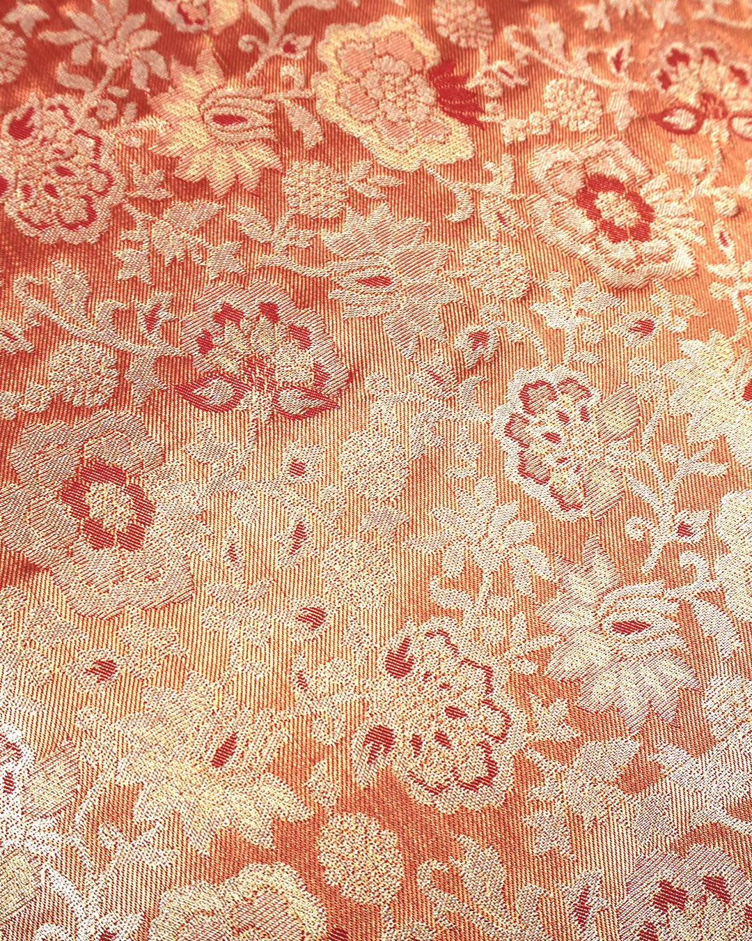 Soft Peach Kanjivaram Silk Saree with Floral Weaving and Paisley Accents