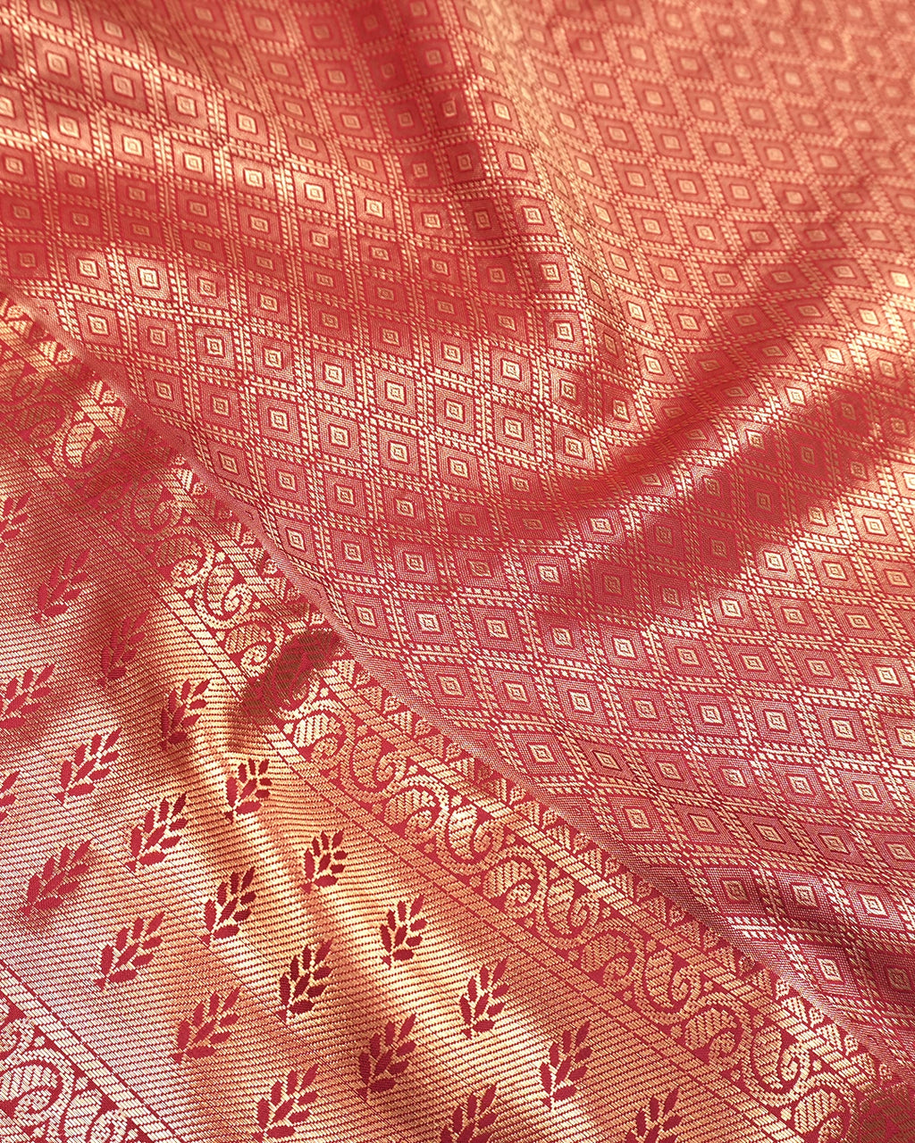 Soft Peach Kanjivaram Silk Saree with Floral Weaving and Paisley Accents