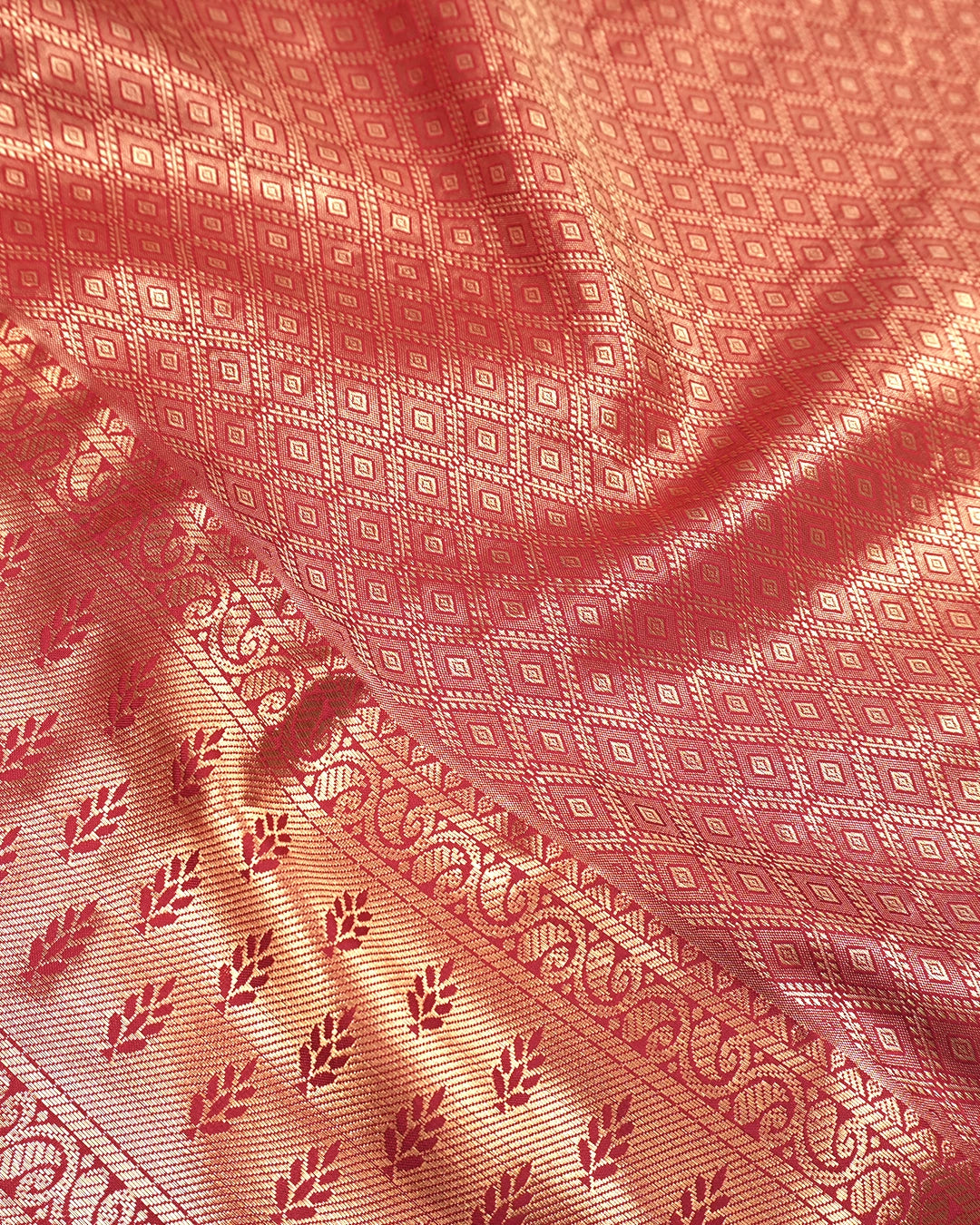 Soft Peach Kanjivaram Silk Saree with Floral Weaving and Paisley Accents