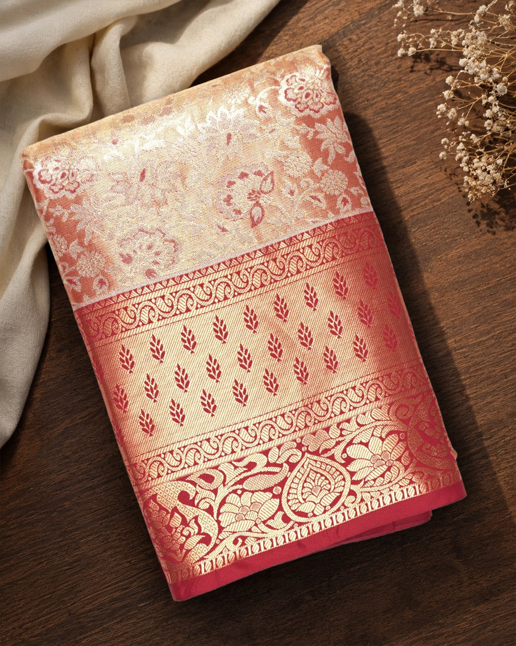 Soft Peach Kanjivaram Silk Saree with Floral Weaving and Paisley Accents