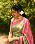 Light Mint Green Kanjivaram Silk Saree with Traditional Peacock Motifs Arch Weaving
