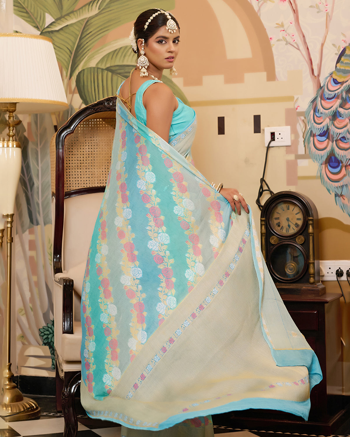 Aqua Blue Pure Chiffon Saree with Zari and Radiant Stripes Floral Detailing