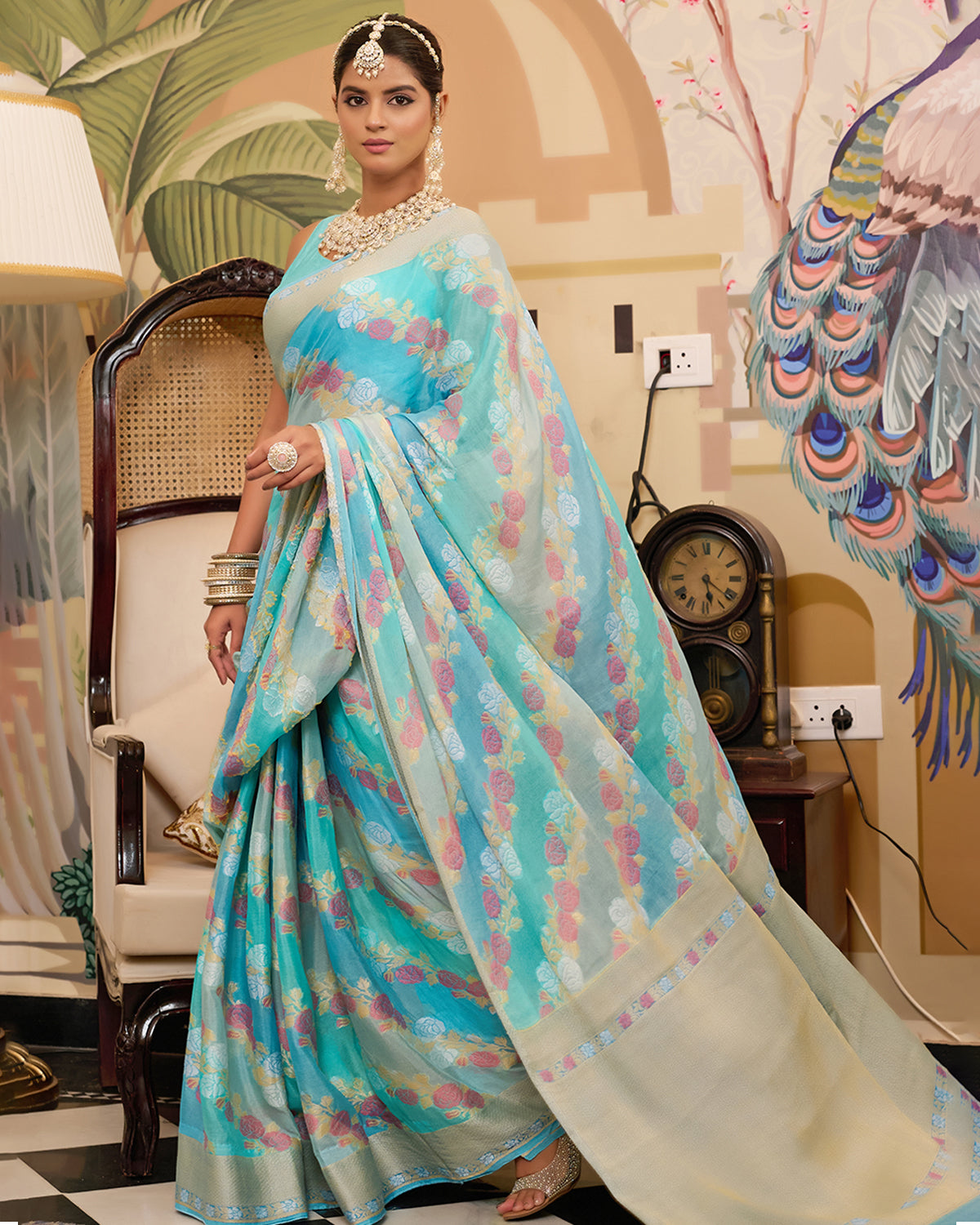 Aqua Blue Pure Chiffon Saree with Zari and Radiant Stripes Floral Detailing