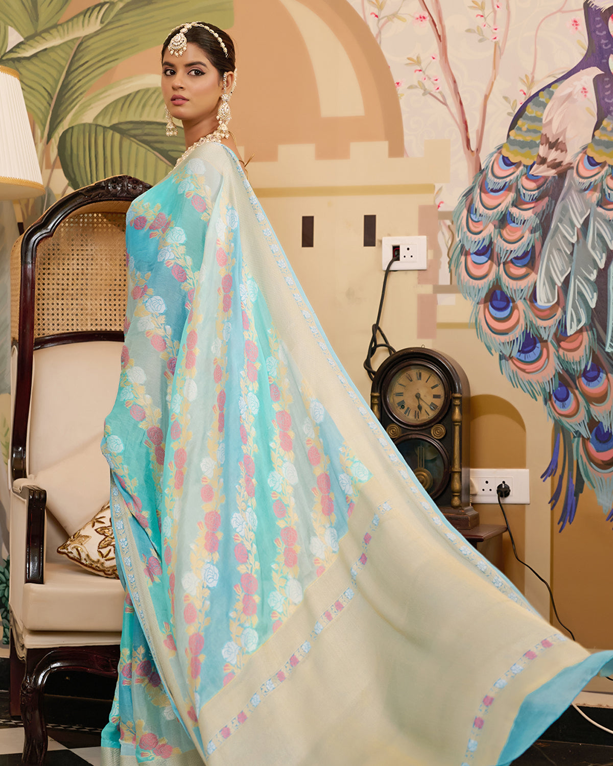 Aqua Blue Pure Chiffon Saree with Zari and Radiant Stripes Floral Detailing